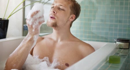 Man Having Bubble Bath In A Bathtub 2 E1442289138368