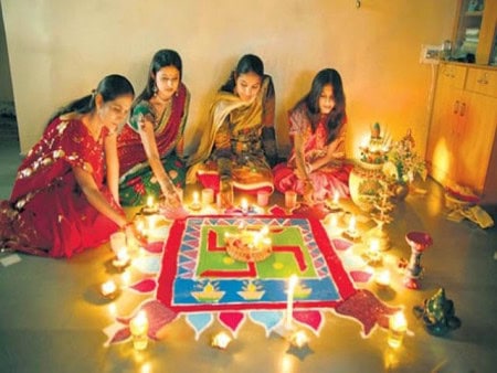 Women Making Rangoli For Diwali