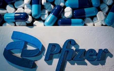 File Photo A 3D Printed Pfizer Logo Is Placed Near Medicines From The Same Manu