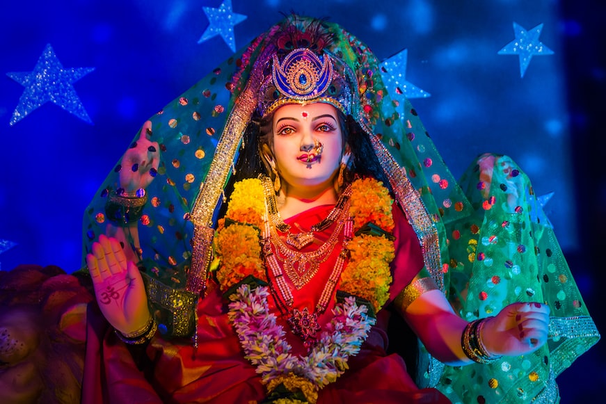 Beautifully adorned Maa Durga being worshiped during Navratri puja