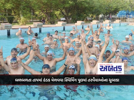 Swimmers Splash In Swimming Pools To Cool Off In The Sweltering Heat
